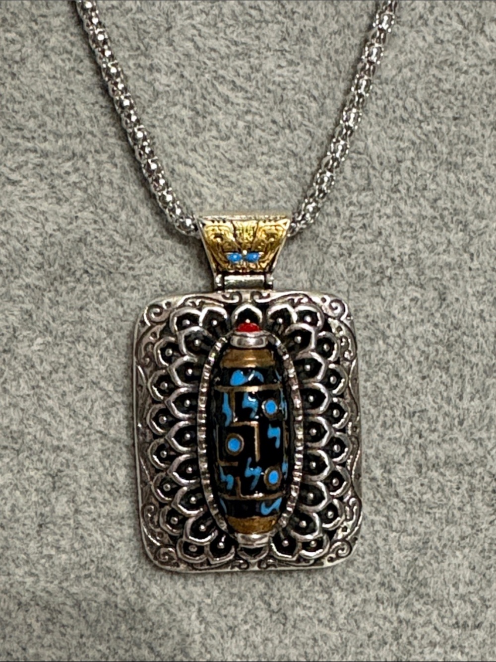 Sterling Silver Filigree Pendant with Blue Accent